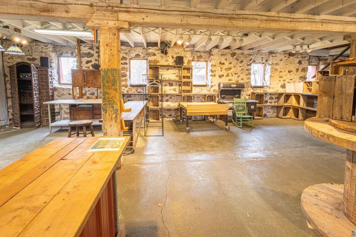 Worktables and shelving in the barn's lower level.